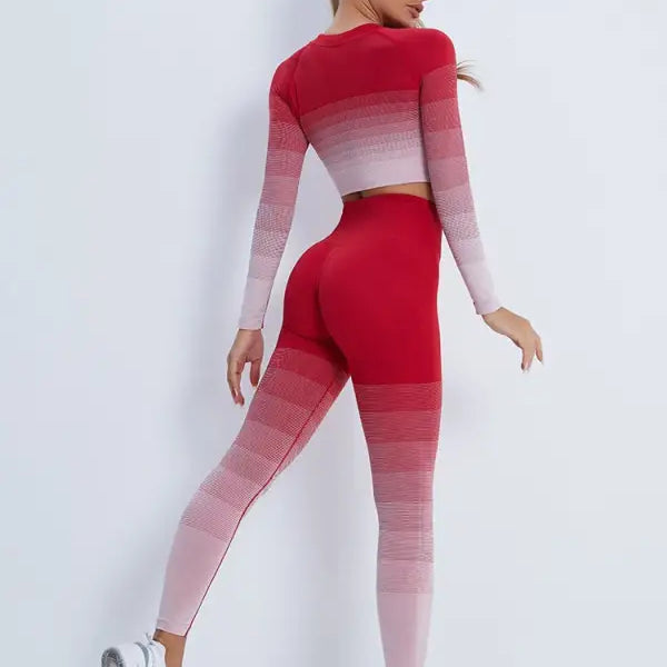 Woman in red ombré workout set with long sleeve top and leggings, stylish activewear
