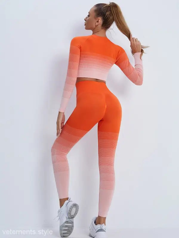 Ombre orange and pink athletic outfit with purple long sleeve, white sneakers, ideal for active wear