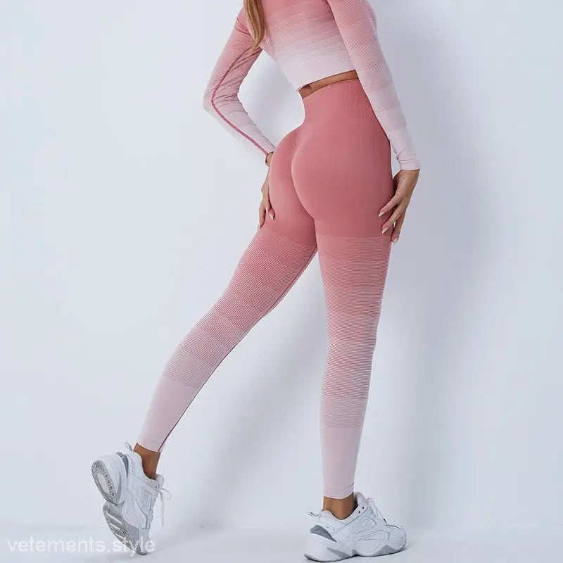 Ombre pink workout leggings with white long-sleeved top and sneakers, stylish purple long sleeve ensemble