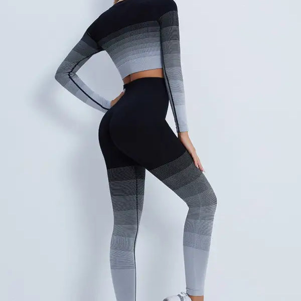 Gradient-patterned workout outfit with black men’s trousers and purple long sleeve top
