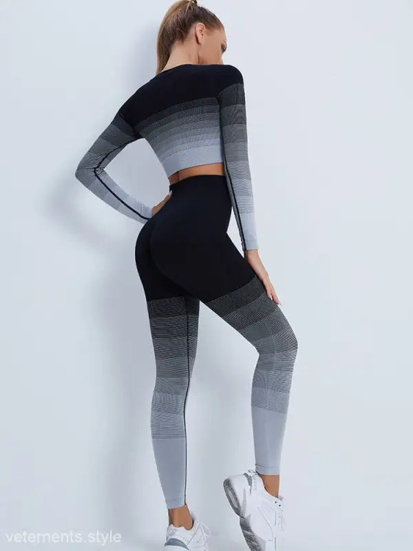 Gradient-patterned workout outfit with black men’s trousers and purple long sleeve top