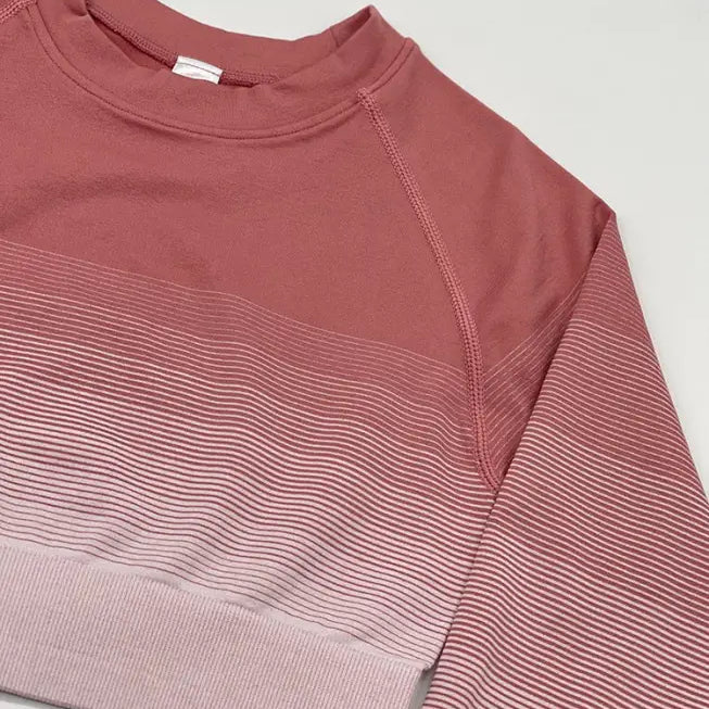 Pink ombré sweatshirt with striped gradient pattern, perfect with black men’s trousers or purple long sleeve