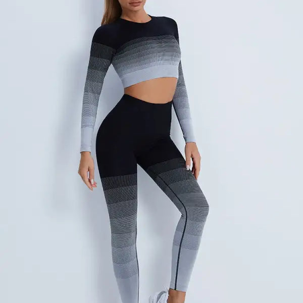 Gradient purple long sleeve crop top with matching ombre high-waisted leggings for active wear