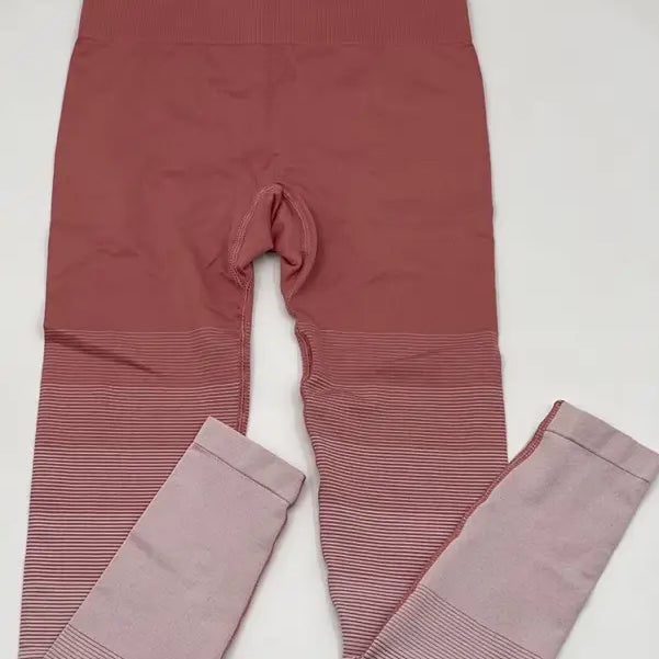 Pink ombré workout leggings with ribbed detailing, ideal with purple long sleeve or orange pink pants