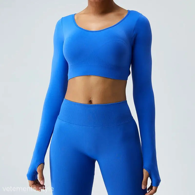 Bright blue workout set with long-sleeved crop top and high-waisted leggings in Klein Blue perfect for Fit Pulse fitness