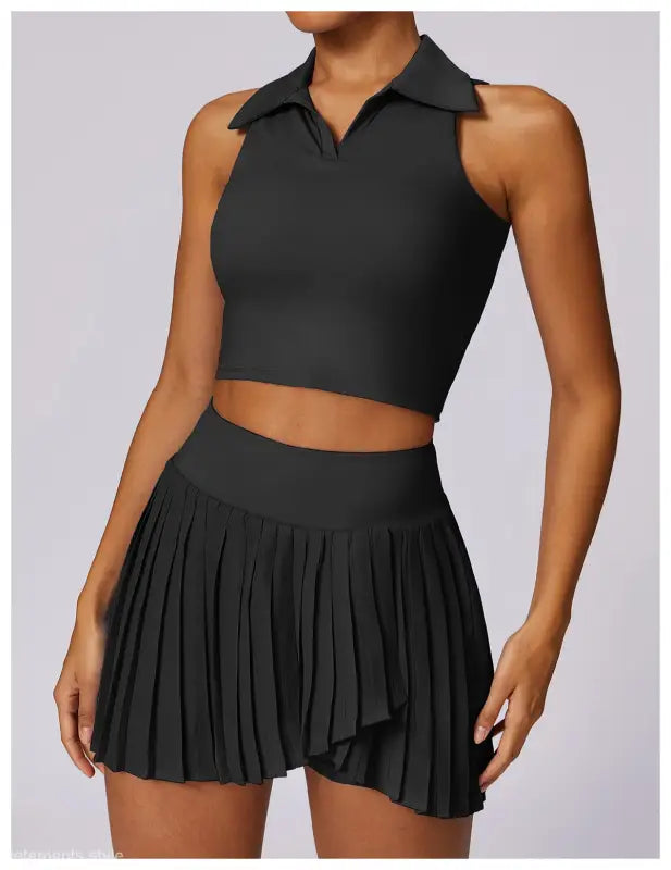 Stylish black sleeveless crop top and pleated mini skirt with Swan White Suit