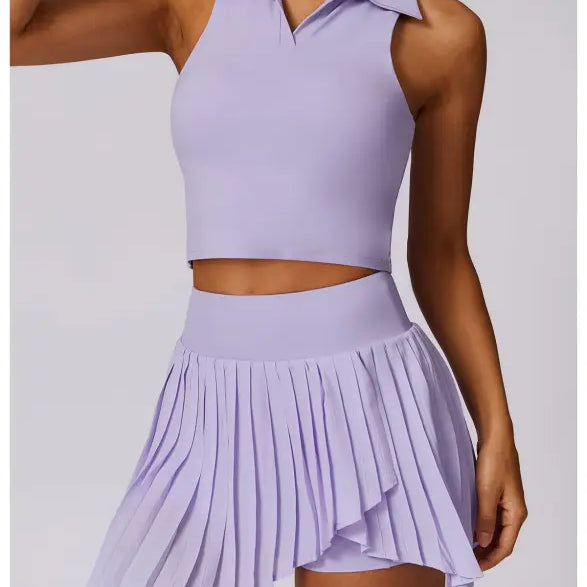 Lavender sleeveless crop top and pleated mini skirt in Swan White Suit ensemble