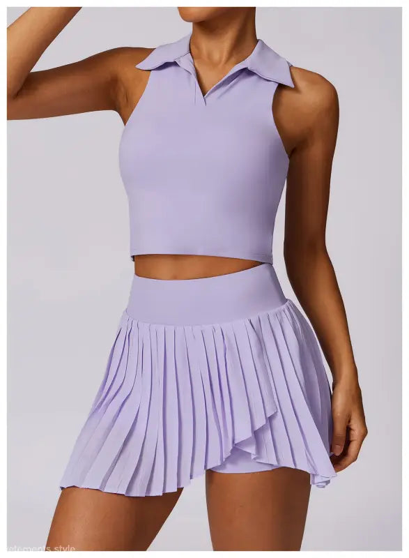Lavender sleeveless crop top and pleated mini skirt in Swan White Suit ensemble