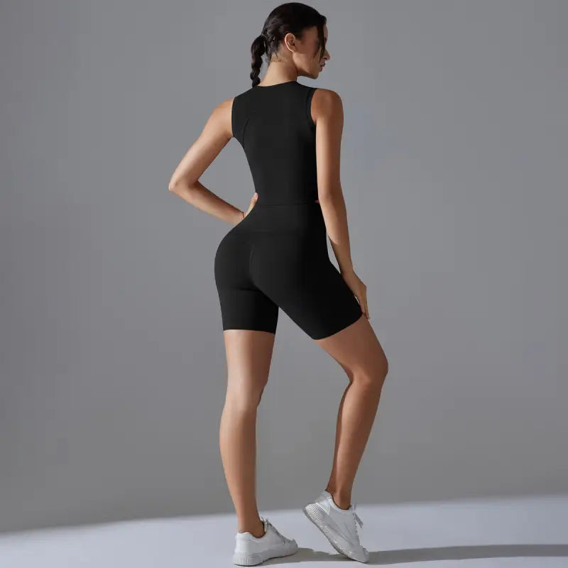 Black sleeveless romper from Sporty Slim Nylon Yoga Set for fitness yoga sessions