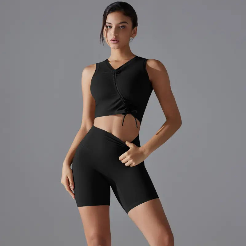 Black athletic crop top and shorts set, ideal for fitness yoga and yoga workouts