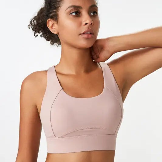 Light pink Sporty Spandex sports bra with integrated mold cup and cutout back