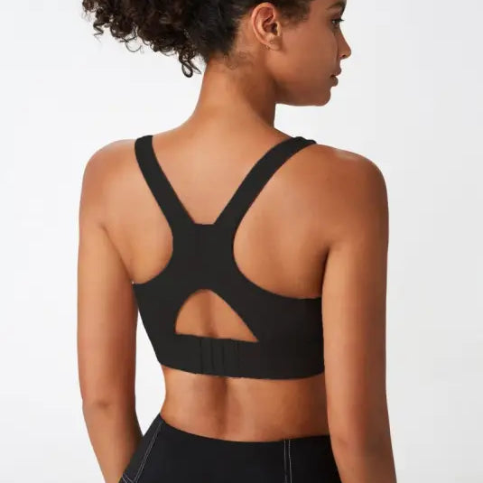 Black sports bra with integrated mold cup and racerback design for activewear