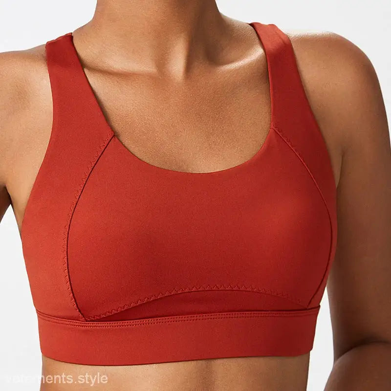 Red sports bra with integrated mold cup and cutout back for active wear
