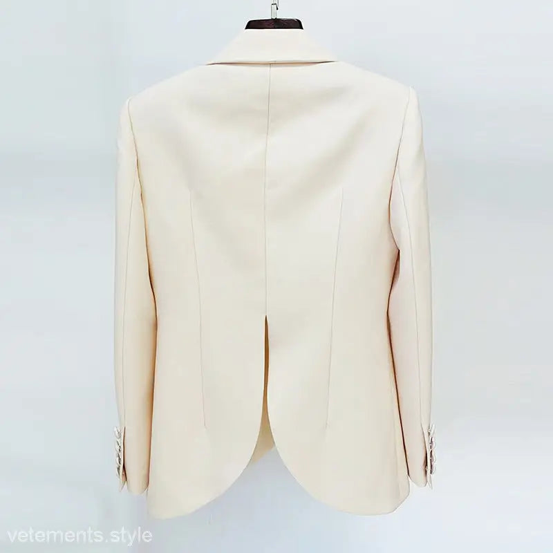 Cream-colored tailored blazer with decorative cuffs from Stars Cover Work Suit collection