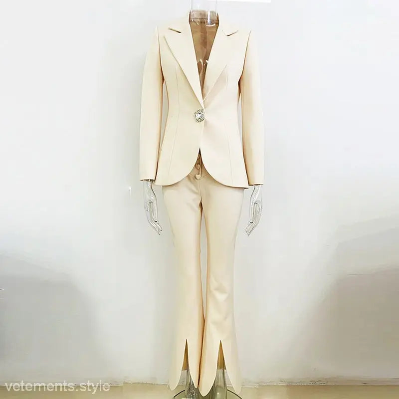 Cream-colored Stars Cover Work Suit features a tailored blazer and split-hem trousers