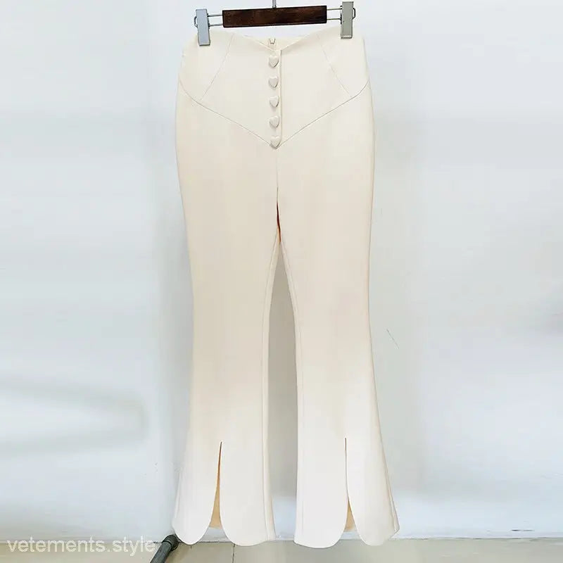Cream-colored flared trousers with buttons and slits from the Stars Cover Work Suit