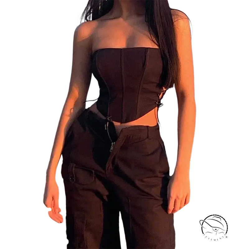 Black strap boning corset top with lace-up detail and cargo pants
