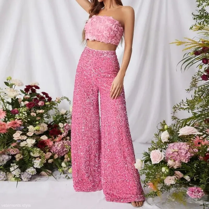 Image of stunning pinky suits featuring a high waist slimming strapless crop top and wide-leg pants for summer elegance