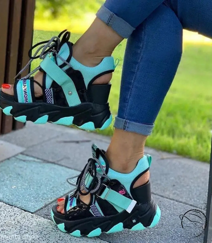 Chunky turquoise and black lace-up buckle punk sandals with high wedge heels
