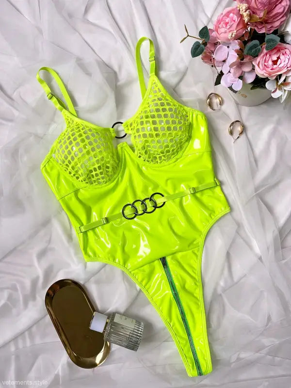 Neon green sexy leather teddy bodysuit with mesh cups for a bold, stylish look