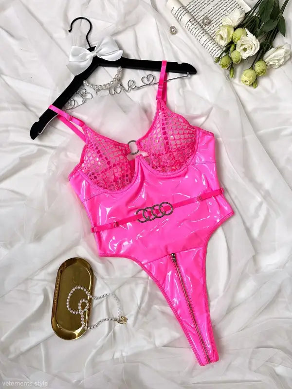 Hot pink shiny bodysuit, a stylish patent leather solid cutout leather teddy