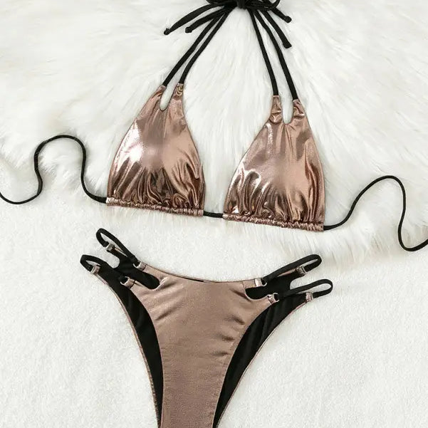 Metallic rose gold bikini with black tie straps and side clasps.