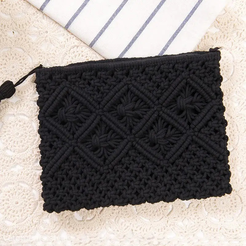 Black macramé clutch purse with diamond pattern, ideal for a Bohemian Beach Bag
