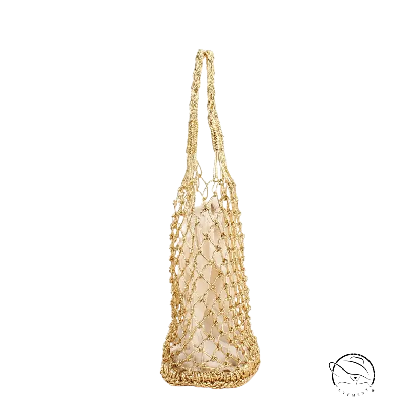 Gold macrame crocheting woven bag with textured pattern and sturdy handles