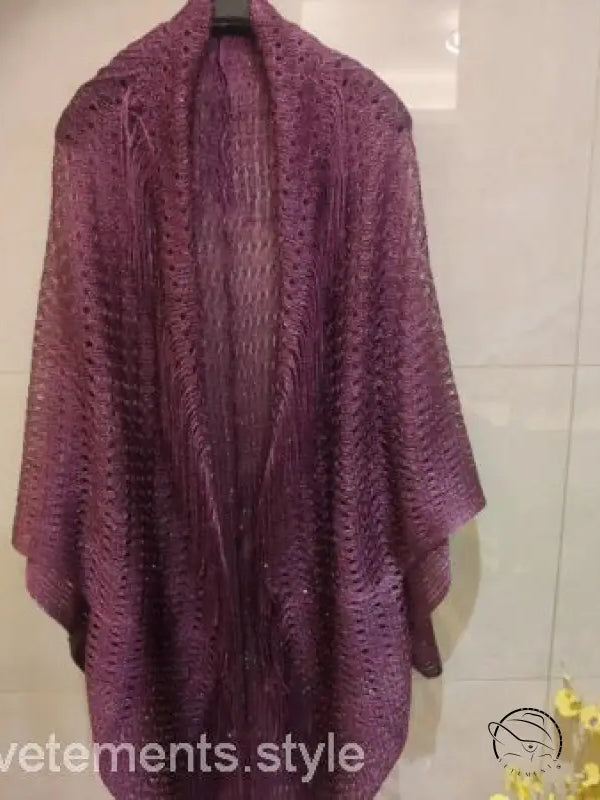 Purple talma shawl beach cover with open-weave pattern and fringe sleeves