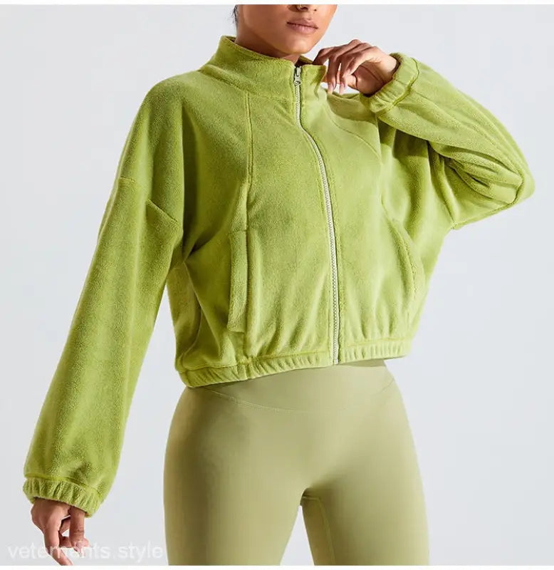 Green fleece sports jacket from Temperament Pink collection for fall winter outdoor wear