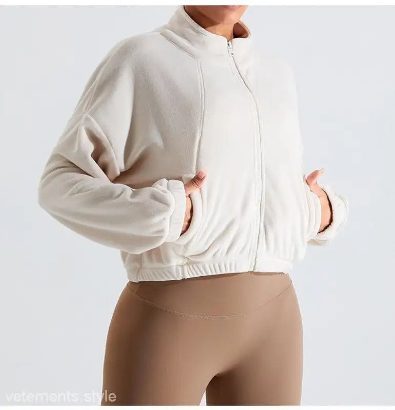 Beige fleece sports jacket featuring temperament pink accents, ideal for fall/winter outerwear