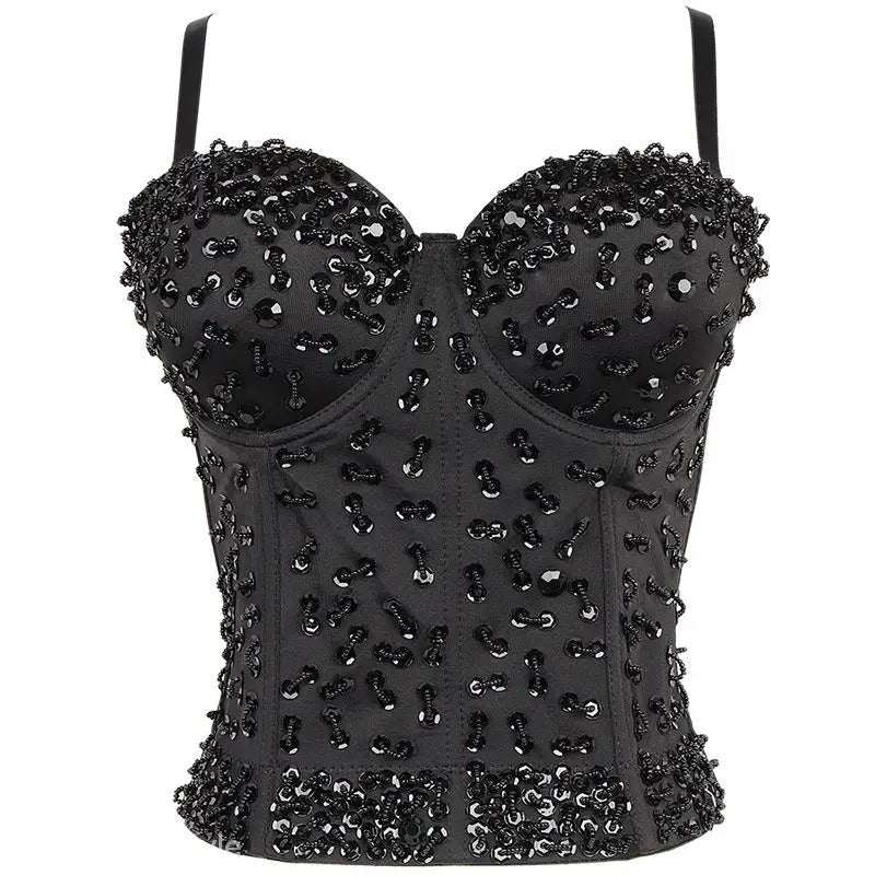 Three dimensional black corset top with rhinestone detail on black background