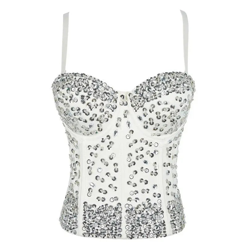 Silver sequined three dimensional corset top with rhinestone detail on black background