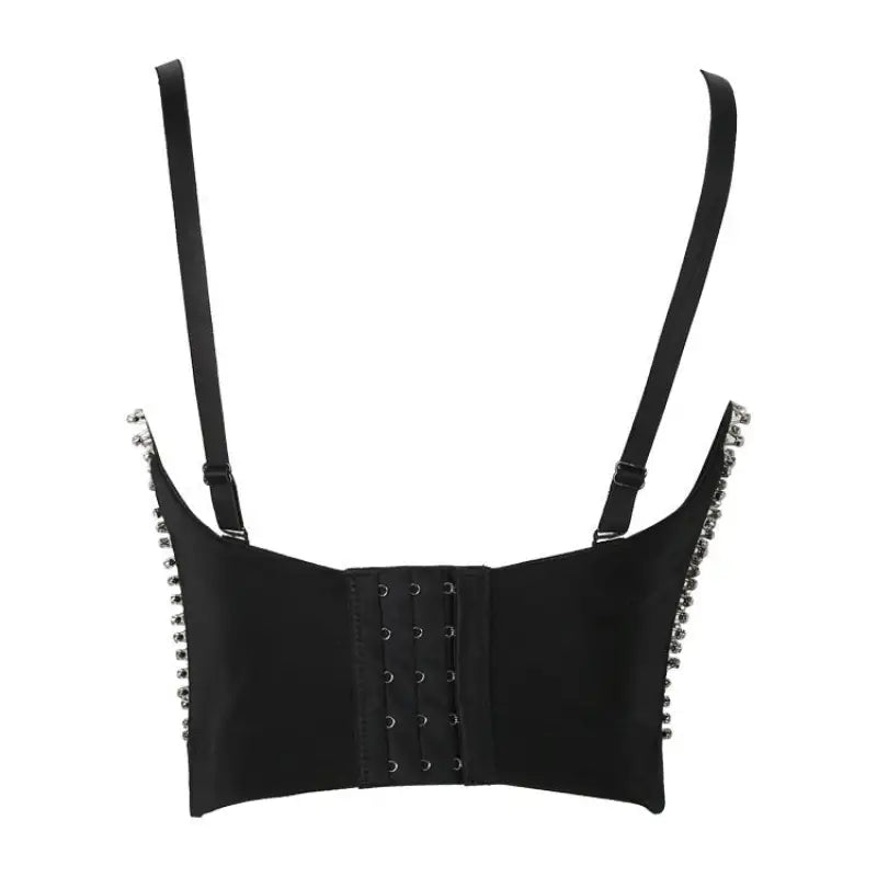 Three dimensional corset top with rhinestone detail on black background
