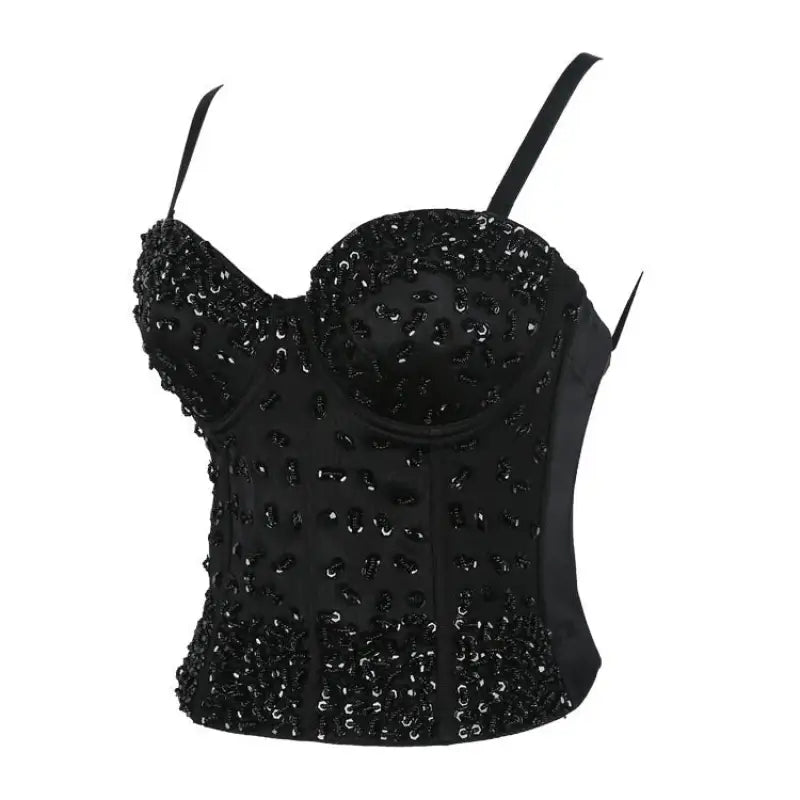 Three dimensional black sequined corset top on black background