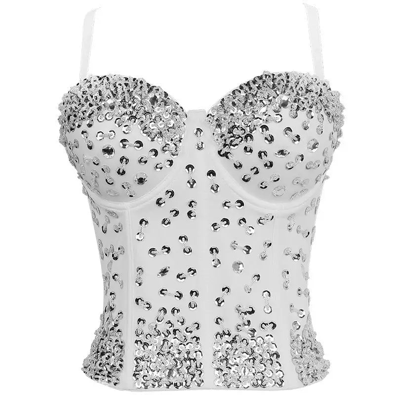 White sequined three dimensional corset top on black background