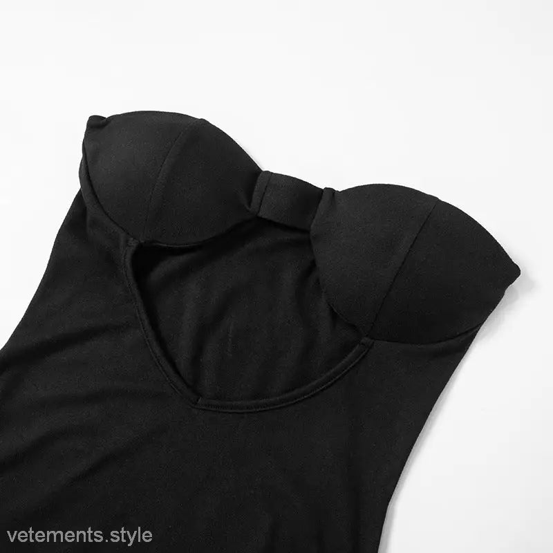 Black strapless bodysuit styled with Trendy Open Bone Dress for a chic bone dress look