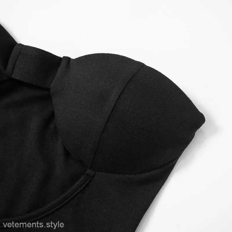 Black bustier top from the Trendy Open Bone Dress asymmetric cutout bodycon midi dress