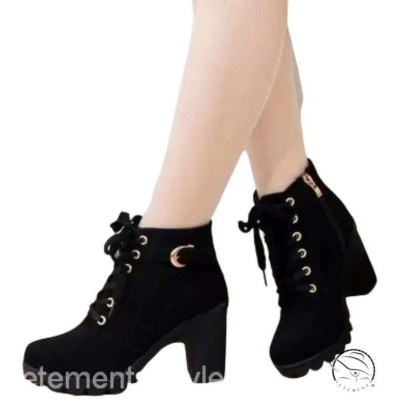 Black waterproof high heel martin leather boots with lace-up ankle, chunky heels, crescent moon detail