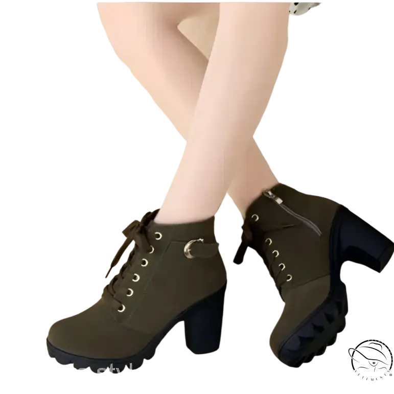 Pair of waterproof high heel martin leather boots for women