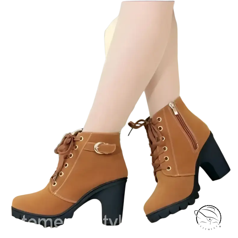 Pair of tan waterproof high heel martin leather boots with chunky heels