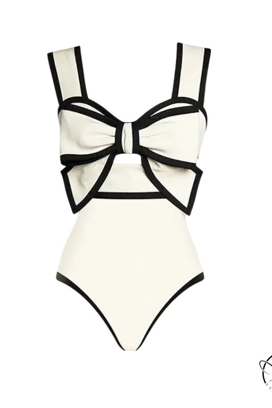 White swimsuit and chiffon beach skirt set with bow detail