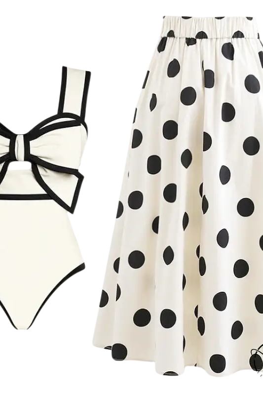 White swimsuit and chiffon beach skirt set with bow detail