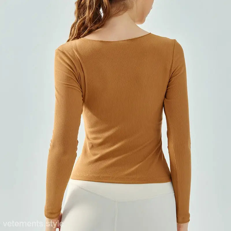 Brown ribbed long-sleeved yoga tee in Milk Tea White with breathable fit and Wild Rose design