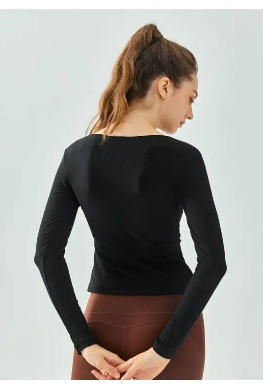 Black long-sleeved yoga top in Milk Tea White with breathable fit, Wild Rose design