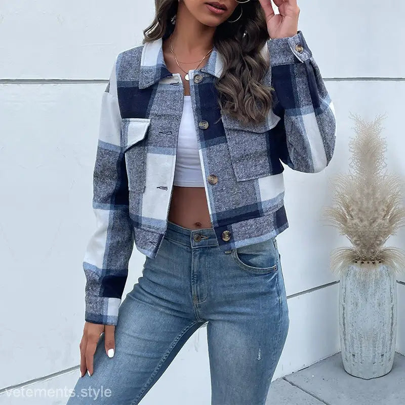 Winter Plaid Long Sleeve Shacket in blue, gray, and white over crop top and jeans