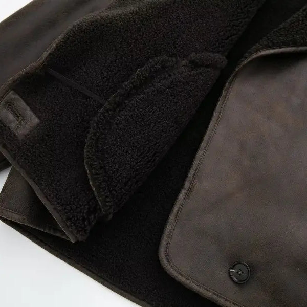 Dark brown faux shearling jacket with black fleece lining and button closures for winter women clothing