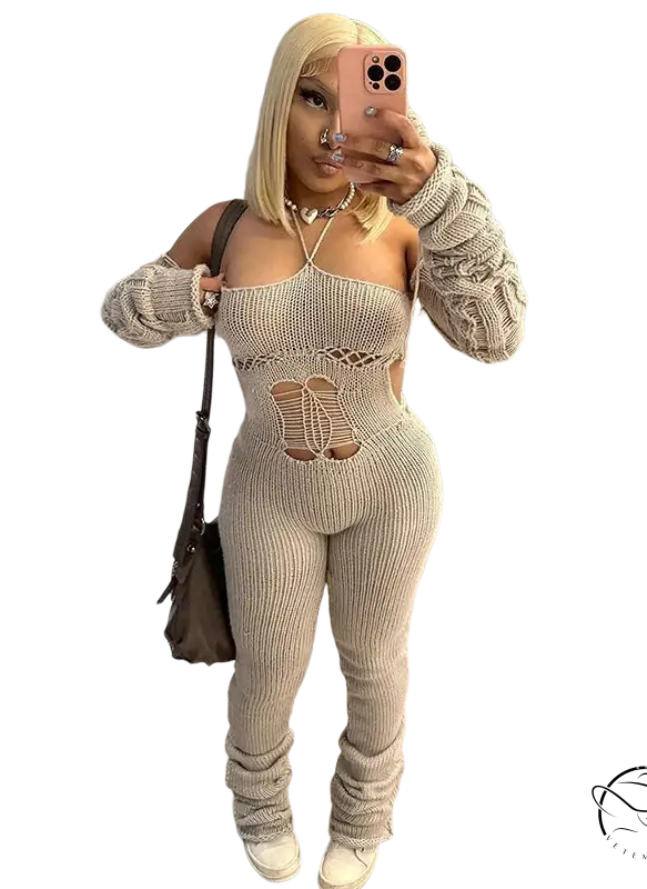 Beige woolen cutout jumpsuit with ribbed knit, cutouts, and ruched cuffs