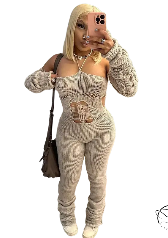 Beige woolen cutout jumpsuit with ribbed knit, cutouts, and ruched cuffs