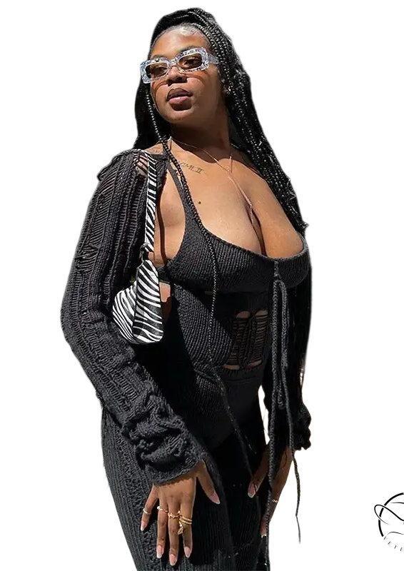 Black knitted cardigan with woolen cutout jumpsuit and tassels